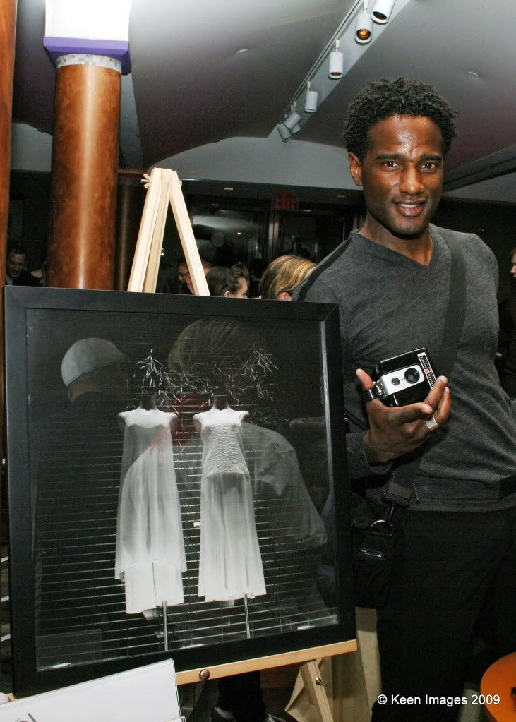 IMG_9514.jpg Eric Henderson and his photograph picture by jsdaily
