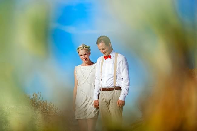 http://i892.photobucket.com/albums/ac125/lovemademedoit/beach_brideandgroom_capetown.jpg?t=1317024114